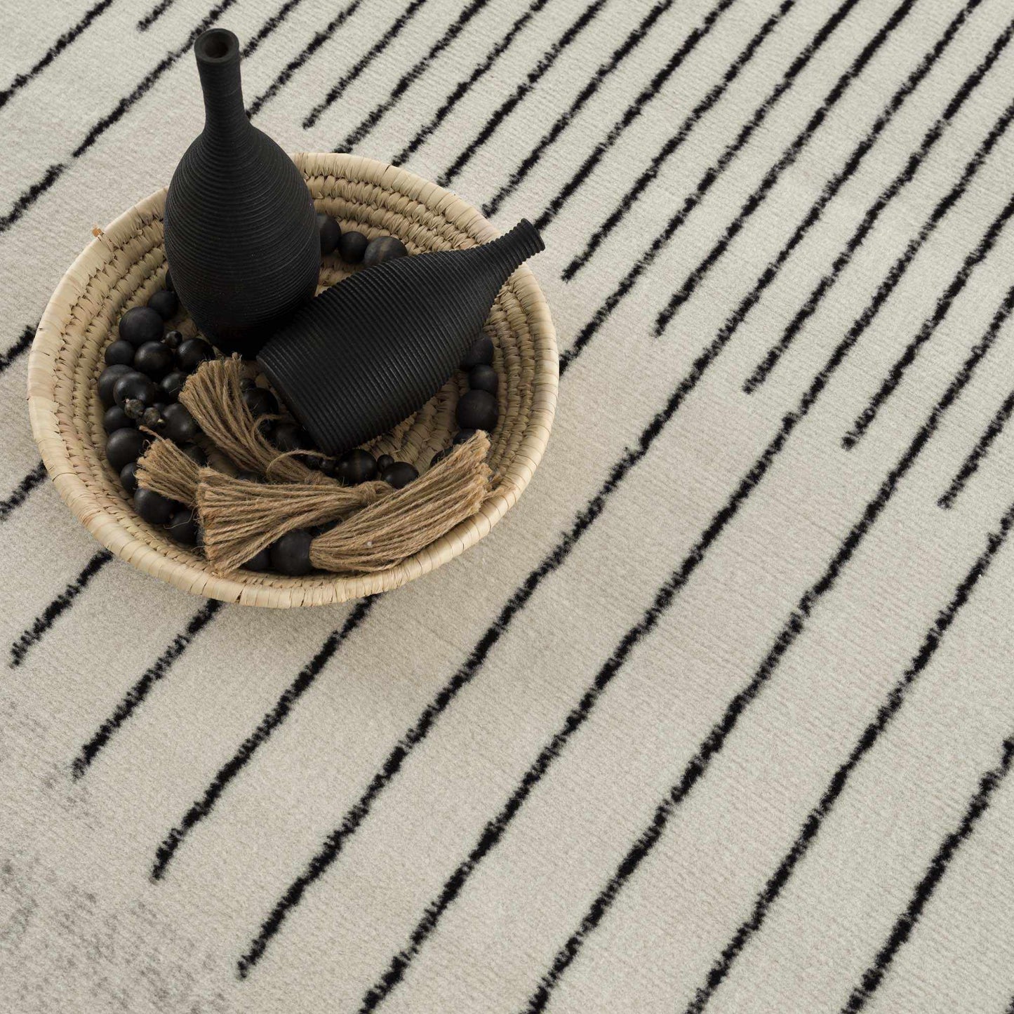 Angus Abstract Black and White Area Rug Hauteloom LLC
