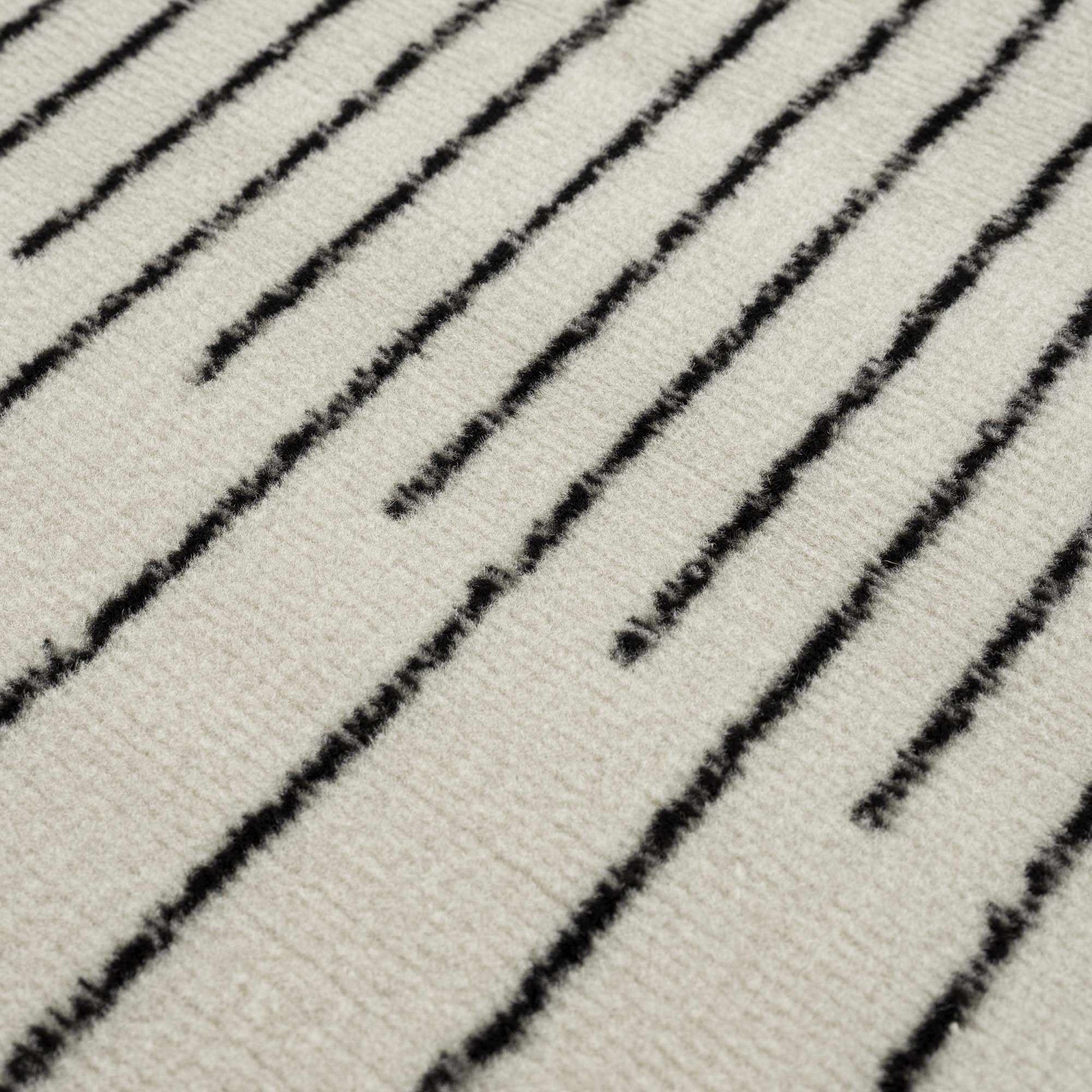 Angus Abstract Black and White Area Rug Hauteloom LLC