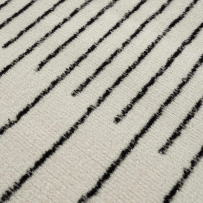 Angus Abstract Black and White Area Rug Hauteloom LLC